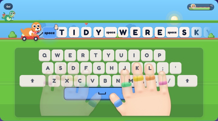 A puppy in a wagon races a dinosaur along a road of letter tiles above a keyboard
